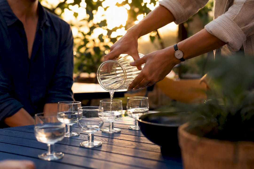 Pouring liquid symbolizing REIT income distribution